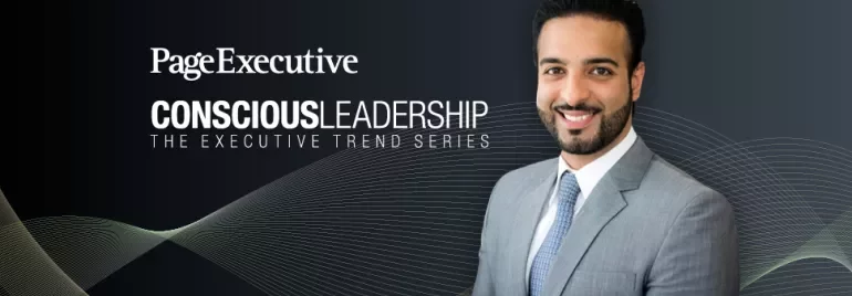 Man in suit smiling next to text 'Conscious Leadership' on dark background.